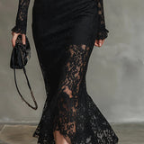 Leonor | Vestido maxi preto de renda.