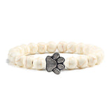 Margarida - Pulseira com estampa de patas decorada com miçangas.