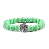Margarida - Pulseira com estampa de patas decorada com miçangas.