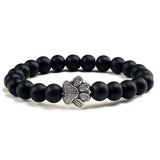 Margarida - Pulseira com estampa de patas decorada com miçangas.