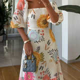 Anny | Vestido midi de gola quadrada com estampado floral e manga folhada - Ines Braga