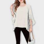 Aria - A blusa de primavera perfeita com um decote redondo - Ines Braga