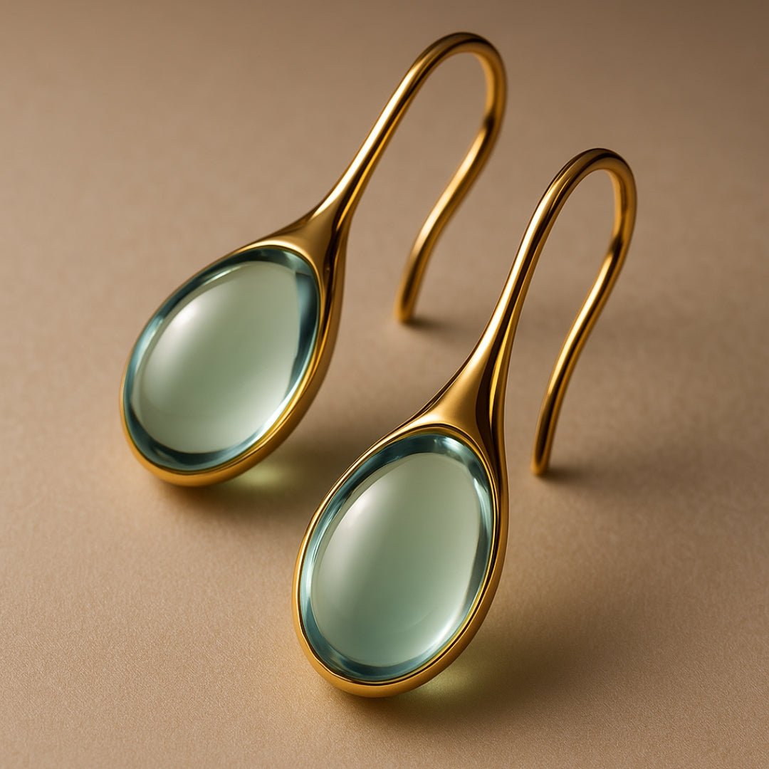 CristalLux Brincos Gota Ouro Prata - Elegância Brilhante - Ines Braga