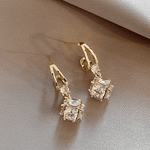 LuzDour Brincos Elegantes com Zircônias em Ouro - Exclusivos - Ines Braga