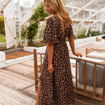 STELLA™ – O Maxi Vestido de Onça que Transforma Seu Visual - Ines Braga