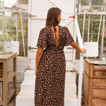 STELLA™ – O Maxi Vestido de Onça que Transforma Seu Visual - Ines Braga