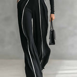 Tammy | Conjunto de top de manga comprida com gola alta e calças de perna larga e cinto - Ines Braga